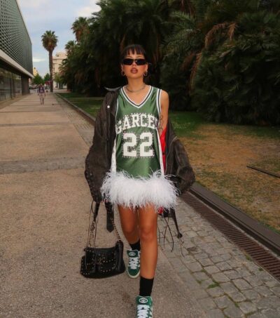 Upcycled green jersey with white ostrich feathers